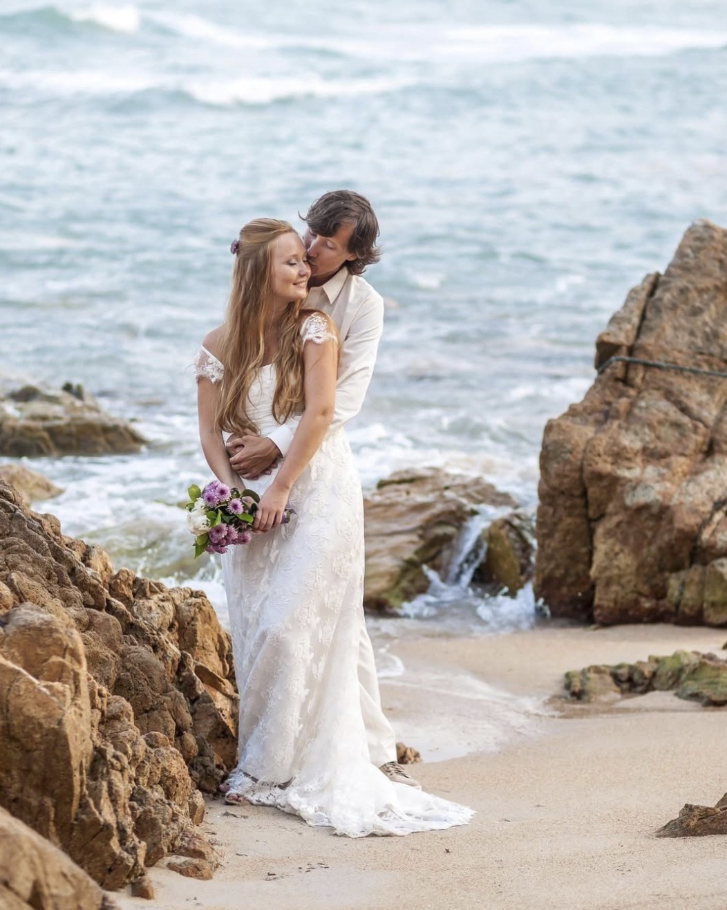 Destination wedding portrait on the rocky coast, Riviera Maya